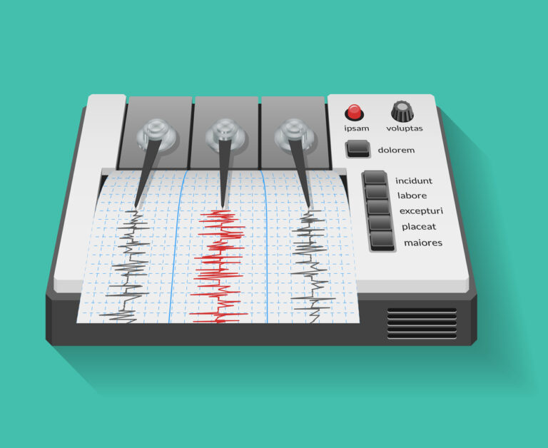 Seismograph machine with graph of seismic and earthquake activity